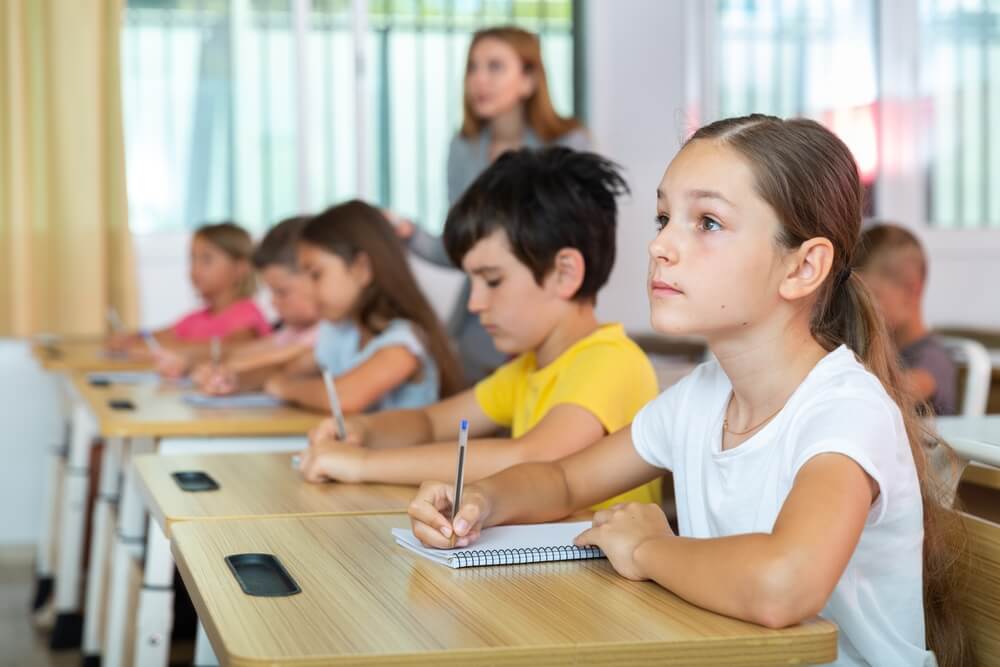 students taking notes in the classroom