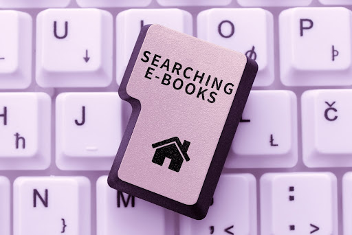 a button on a keyboard titled "searching e-books"
